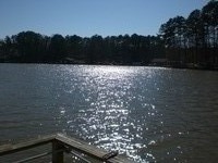 Lakehouse Vacation Rental - Lake Homes for rent on LakeHouseVacations.com, Lake property, Lake House Lake House Relax And Enjoy Lake Sinclair In This Amazing 4br 3bath Rental With 250\' Lake Front, View of Lake at Dusk from Dock, on Lake Sinclair in Georgia - Lakehouse Vacation Rental - Lake Home for rent on LakeHouseVacations.com