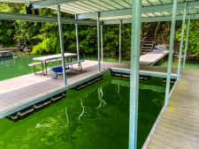 Lake House 6 Bd Lakefront Flat Hollow Cabin With Dock + Hot Tub, Norris Lake\'s unique emerald green color and inviting crystal clear water , on Norris Lake in Tennessee - Lakehouse Vacation Rental - Lake Home for rent on LakeHouseVacations.com