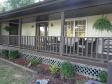 Lakehouse Vacation Rental - Lake Homes for rent on LakeHouseVacations.com, Lake property, Lake House Lake House A Newly Updated 4 Bedroom 3 Bath Lake Home With Panoramic View!! New Boatdock!!!!!!!, Porch off living room overlooking the lake, on Lake Sara in Illinois - Lakehouse Vacation Rental - Lake Home for rent on LakeHouseVacations.com