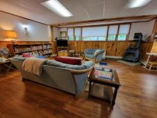 Lake House 3 Bedroom, 3 Bath Tranquil Lakeside Retreat In Wayne, Maine On Dexter Pond, Entertainment room lower level, on Dexter Pond in Maine - Lakehouse Vacation Rental - Lake Home for rent on LakeHouseVacations.com