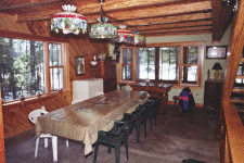 Lakehouse Vacation Rental - Lake Homes for rent on LakeHouseVacations.com, Lake property, Lake House Lake House Bowerbank Maine Vacation Rental Chalet Style House On Sebec Lake, living room, on Sebec Lake in Maine - Lakehouse Vacation Rental - Lake Home for rent on LakeHouseVacations.com