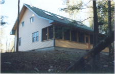 Lakehouse Vacation Rental - Lake Homes for rent on LakeHouseVacations.com, Lake property, Lake House Lake House Bowerbank Maine Vacation Rental Chalet Style House On Sebec Lake, back of house, on Sebec Lake in Maine - Lakehouse Vacation Rental - Lake Home for rent on LakeHouseVacations.com
