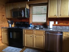 Lakehouse Vacation Rental - Lake Homes for rent on LakeHouseVacations.com, Lake property, Lake House Lake House Southern Cedar Log Cabin New 2015, kitchen, on Lake Barkley in Kentucky - Lakehouse Vacation Rental - Lake Home for rent on LakeHouseVacations.com