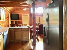 Lakehouse Vacation Rental - Lake Homes for rent on LakeHouseVacations.com, Lake property, Lake House Lake House Southern Cedar Log Cabin New 2015, another view of kitchen, on Lake Barkley in Kentucky - Lakehouse Vacation Rental - Lake Home for rent on LakeHouseVacations.com
