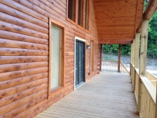 Lakehouse Vacation Rental - Lake Homes for rent on LakeHouseVacations.com, Lake property, Lake House Lake House Southern Cedar Log Cabin New 2015, front wrap around deck, on Lake Barkley in Kentucky - Lakehouse Vacation Rental - Lake Home for rent on LakeHouseVacations.com
