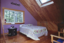Lakehouse Vacation Rental - Lake Homes for rent on LakeHouseVacations.com, Lake property, Lake House Lake House Bowerbank Maine Vacation Rental Chalet Style House On Sebec Lake, master bed, on Sebec Lake in Maine - Lakehouse Vacation Rental - Lake Home for rent on LakeHouseVacations.com