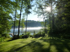 Lakehouse Vacation Rental - Lake Homes for rent on LakeHouseVacations.com, Lake property, Lake House Lake House Log House Maine Lake Shore Boats Fishing Swim Spa, Early morning mist on the pond, just as sun rises. Great time for bird watching., on Sand Pond in Maine - Lakehouse Vacation Rental - Lake Home for rent on LakeHouseVacations.com