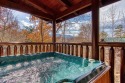 Cozy 2 Bedroom Log Cabin with Hot Tub, on Powdermilk Creek - Gatlinburg, Lake Home rental in Tennessee