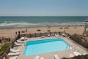 Rudicile Overlook Both Pool and Sandy Beaches From This Oceanfront Condo on Atlantic Ocean - Kure Beach in North Carolina for rent on LakeHouseVacations.com