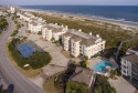 Lange W-Dunes Coastal style condo nestled in the dunes at the north end on Atlantic Ocean - Wrightsville Beach in North Carolina for rent on LakeHouseVacations.com