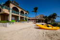 Beachfront. Close to Secret Beach. Kayaks. Bikes. Pool. Paddleboards. 4BDR, on , Lake Home rental in Belize District