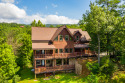 Massive Gatlinburg lodge with Mountain views, hot tub, pool table, bunk beds!, on West Prong Little Pigeon River - Gatlinburg, Lake Home rental in Tennessee