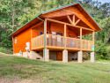 Right off the river, a beautiful cabin with a new hot tub! Comfy livingroom!, on West Prong Little Pigeon River, Lake Home rental in Tennessee