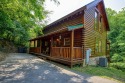 Pigeon Forge Log Cabin near Parkway with Arcade, Pool access, & Pool Table, on West Prong Little Pigeon River, Lake Home rental in Tennessee