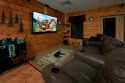 Parkway Pigeon Forge Resort Cabin with Theater Room, Game Room, & Pool Access, on West Prong Little Pigeon River, Lake Home rental in Tennessee