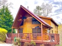Custom Log Home with EV Charging Station, Game Room, and Mountain Views on West Prong Little Pigeon River - Gatlinburg in Tennessee for rent on LakeHouseVacations.com