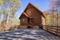 Sky Harbor stunning log cabin with game room and home theater! on Douglas Lake in Tennessee for rent on LakeHouseVacations.com