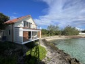 Touch of Class Cottage, A Beachfront Cottage on the Warm Calm Caribbean, on , Lake Home rental in South Eleuthera