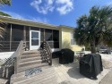New Vacation CottageRays A GlassNow Available-sleeps 7 Cottage for rent 5601 State Hwy 180 Gulf Shores, Alabama 36542