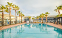 Pool-side condo, in-town location, boardwalk to the beach!, on , Lake Home rental in Texas