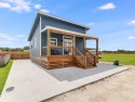 Steps away from sandy beaches, vibrant culture, and recreational amenities., on , Lake Home rental in Texas