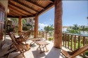Welcome in the island breeze or head outside to sit on the large deck, Condo for rent 4.5 Miles North Ambergris Caye San Pedro Town, Belize District 00000